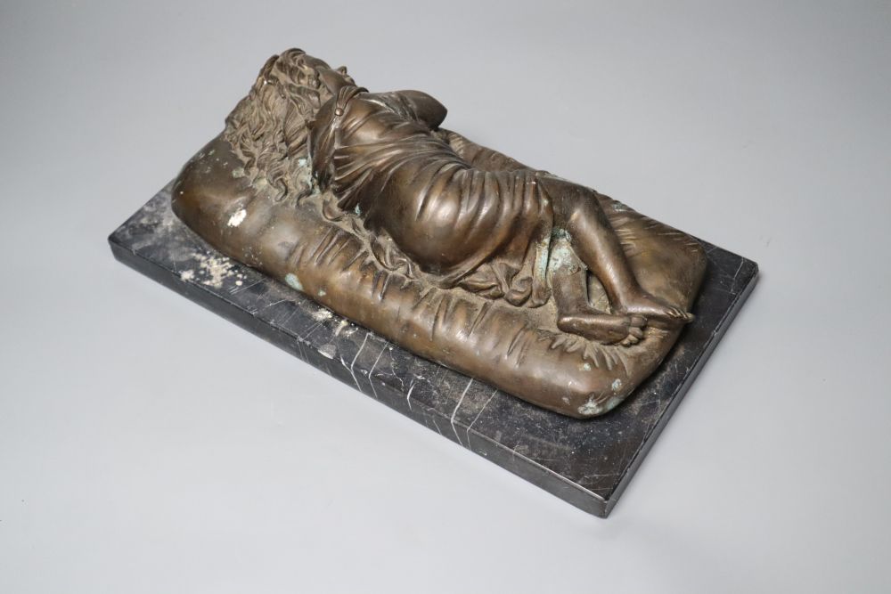 A bronze of a sleeping child